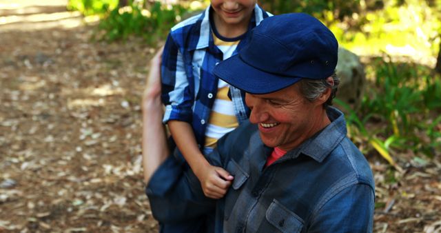 Smiling Father and Daughter Spending Time in Forest - Download Free Stock Images Pikwizard.com