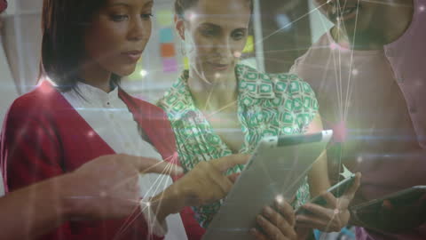 Diverse Team Collaborating with Digital Technology and Connections