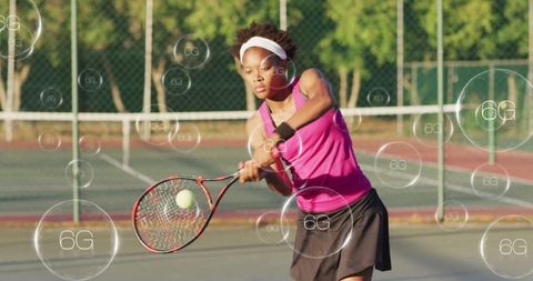 Female Tennis Player Swinging Forehand on Outdoor Hard Court