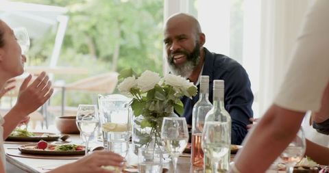 Elegant Guests Socializing at Stylish Wedding Reception