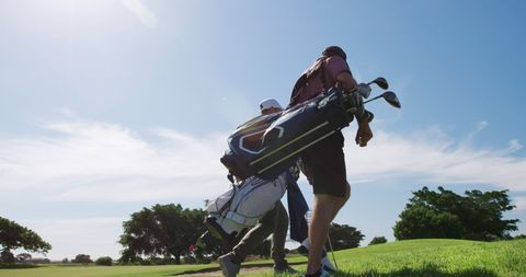 Caucasian Man Enjoying Leisurely Day at Golf Course - Download Free Stock Images Pikwizard.com