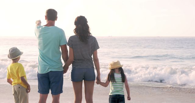 Family Enjoying Togetherness on Beach Vacation - Download Free Stock Images Pikwizard.com