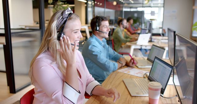 Smiling Customer Service Representatives Working in Modern Call Center - Download Free Stock Images Pikwizard.com