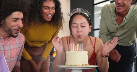 Diverse Colleagues Celebrating Office Birthday with Cake