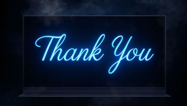 Electric Blue Neon Thank You Sign on Glass Panel with Foggy Studio Glow and Luminous Cursive Script