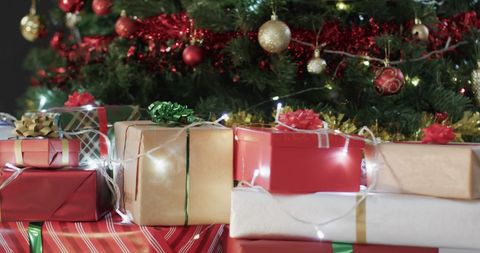 Beautifully Wrapped Holiday Gifts Under Christmas Tree - Download Free Stock Images Pikwizard.com