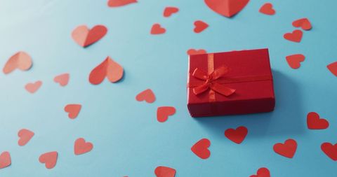 Red Gift Box and Paper Hearts on Blue for Valentine Celebration - Download Free Stock Images Pikwizard.com