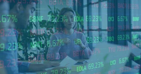 Business Professionals Analyzing Stock Metrics with Digital Projection