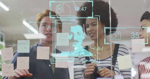 Digital interface study with diverse team in modern office