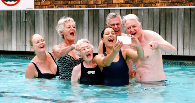 Joyful seniors share a happy, active moment with a poolside selfie. - Download Free Stock Photos Pikwizard.com