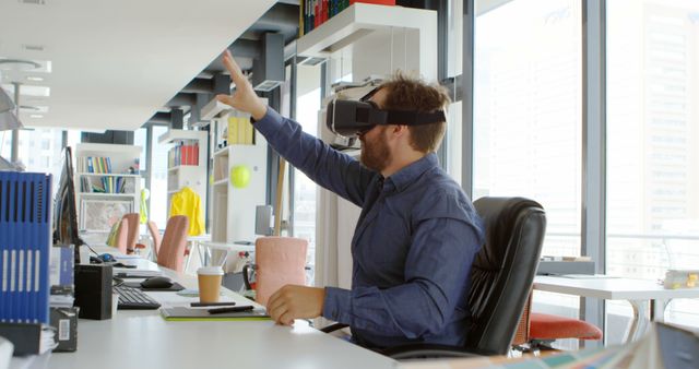 Man Leveraging Virtual Reality for Creative Design Work in Modern Office - Download Free Stock Images Pikwizard.com