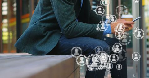 Businessman Engaging with Social Network via Smartphone