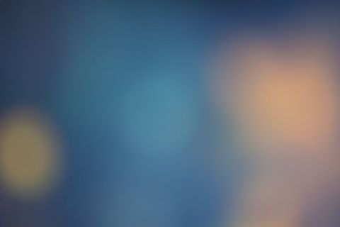 Soft Abstract Blurred Light Background with Blue and Orange Hues