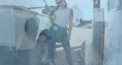 Abstract Infographic Interface over Busy Gas Station Scene