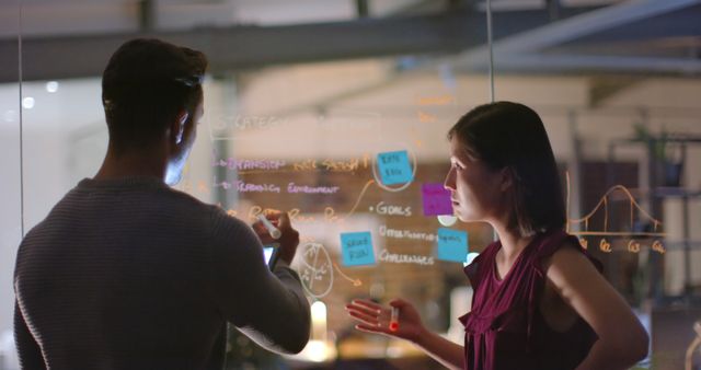 Colleagues Brainstorming Ideas on Glass Wall - Download Free Stock Images Pikwizard.com