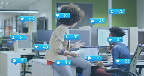 Women collaborating in modern office with social media engagement badges and teamwork