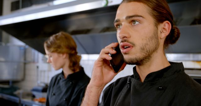 Chefs Working in Commercial Kitchen, Communicating for Order Coordination - Download Free Stock Images Pikwizard.com