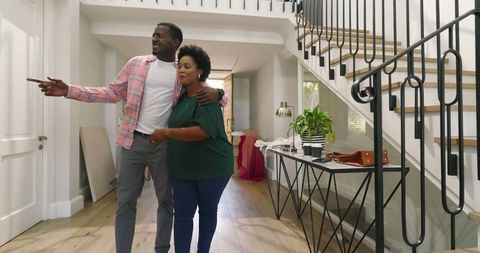 Happy Couple Embracing and Enjoying Coffee in Bright Hallway