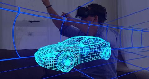 Man experiencing virtual car design with vr headset at home