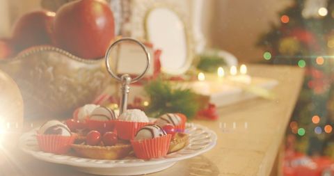 Festive Christmas Table with Desserts and Holiday Decorations