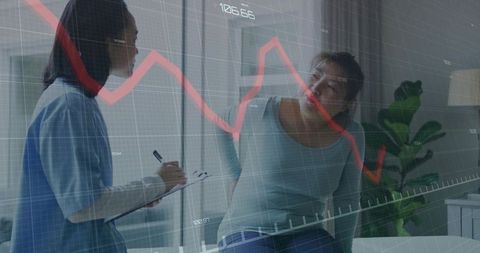 Doctor Consulting Patient with Overlaid Stock Market Graph