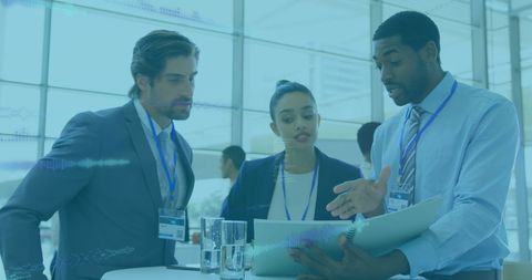 Team Collaborating on Financial Strategies in Modern Office