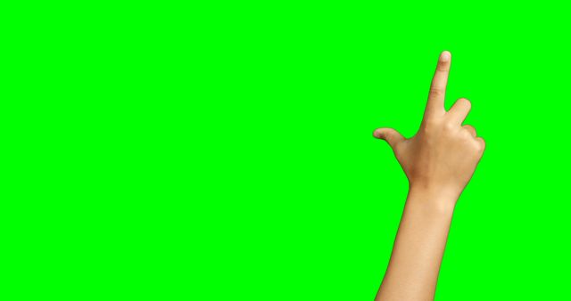 Close-Up of Hand Pointing Against Green Background - Download Free Stock Images Pikwizard.com