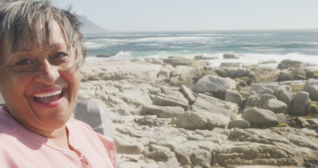 Mature Woman Enjoying Coastal Scenery - Download Free Stock Images Pikwizard.com