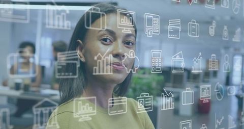 Businesswoman Gazing Through Glass with Data Icon Overlay in Modern Office Workspace