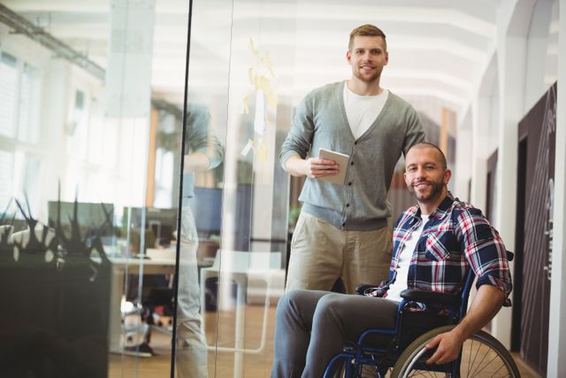 Portrait of handicap businessman with colleague in creative office