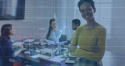 Confident businesswoman with financial data and team in modern office