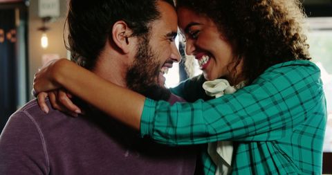 Joyful Embrace of a Young Couple in Love