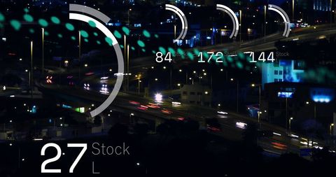 Highway traffic at night with digital overlay