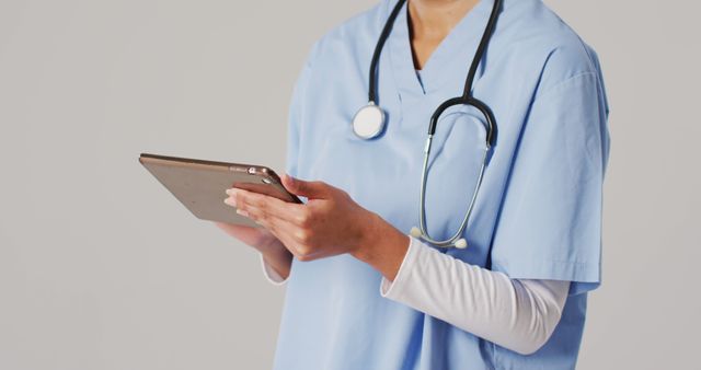 Medical Professional Using Digital Tablet in Hospital Setting - Download Free Stock Images Pikwizard.com