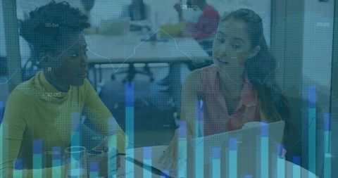 Business Team Analyzing Data on Laptop in Modern Office Environment