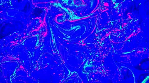 Flowing Neon Marble Loop Showing Cyan Ribbons and Magenta Fleck Motion