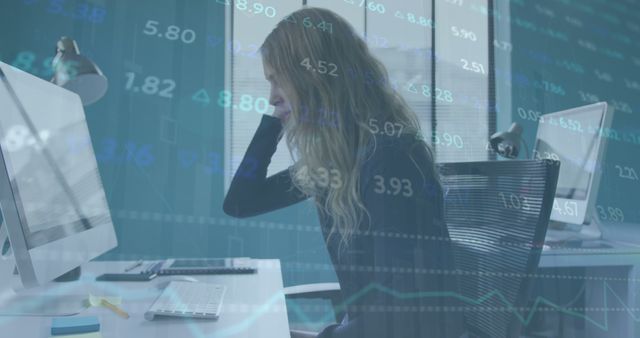 Image of stock market data processing against stressed caucasian woman working at office. Global economy and business technology concept
