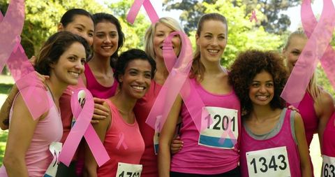 Diverse Women Supporting Breast Cancer Awareness at Running Event