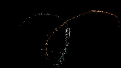 Dramatic Splash of Water in Darkness