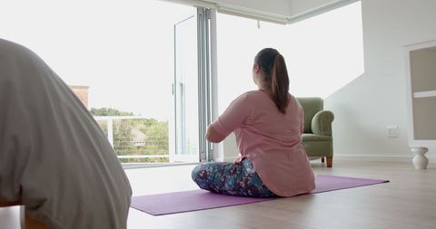 Plus Size Woman Practicing Yoga Meditation Indoors - Download Free Stock Images Pikwizard.com