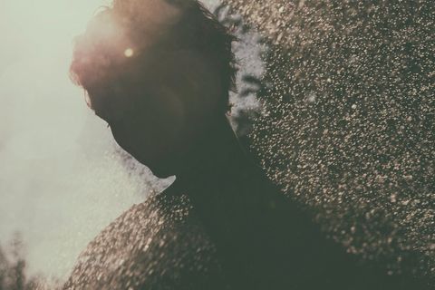 Silhouette Moments Under Sunlit Fur Rain