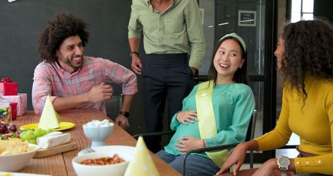 Colleagues Celebrating Baby Shower with Joyful Moments