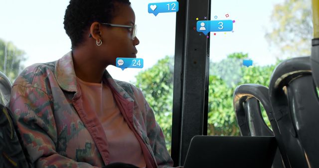 Speech bubble with increasing numbers against african american woman sitting in the bus. Social media networking technology concept