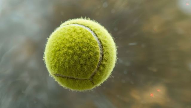 Floating Tennis Ball Capturing Motion and Energy in Abstract Style