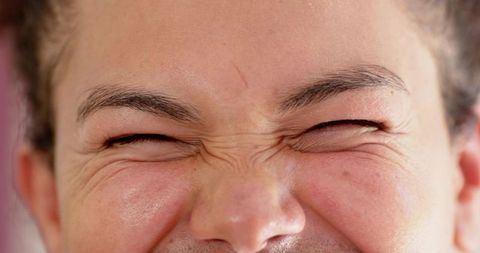 Face with intense expression showing skin texture