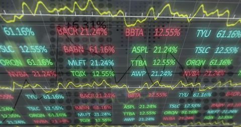 Neon stock market display reflecting live trading data with ticker symbols and line graphs
