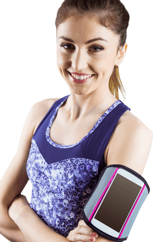 Fit woman in workout top with transparent smartphone armband