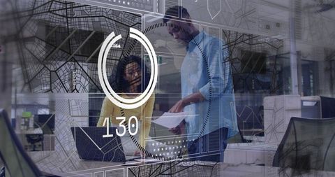 Diverse team collaborating with augmented reality analytics overlay in modern open office