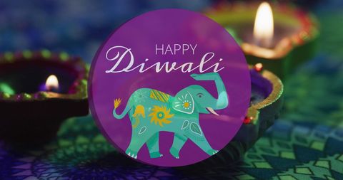 Festive diwali greeting with elephant and lit candles