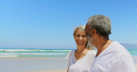 Joyful Senior African American Couple Relaxing on Beach - Download Free Stock Images Pikwizard.com
